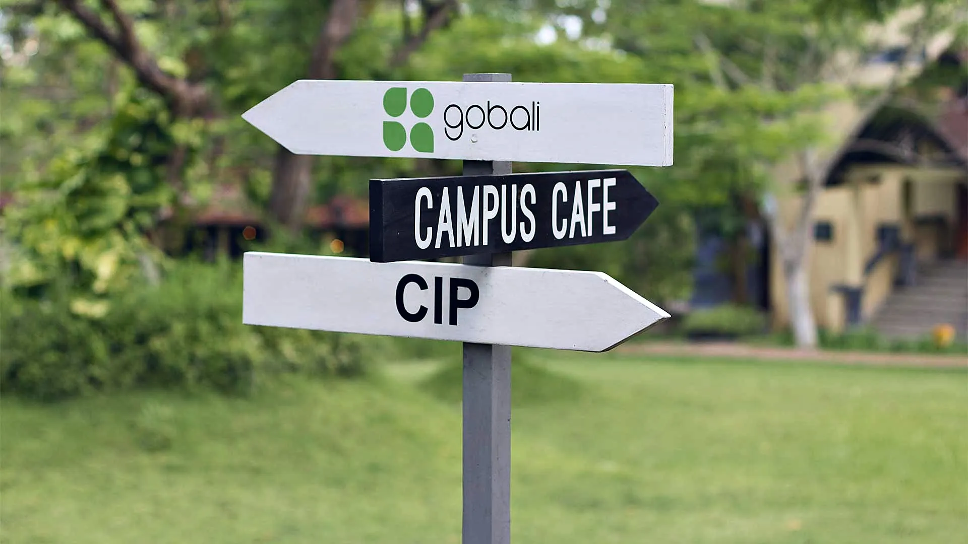 Signpost to the GoBali building and campus café at Udayana University, Bali