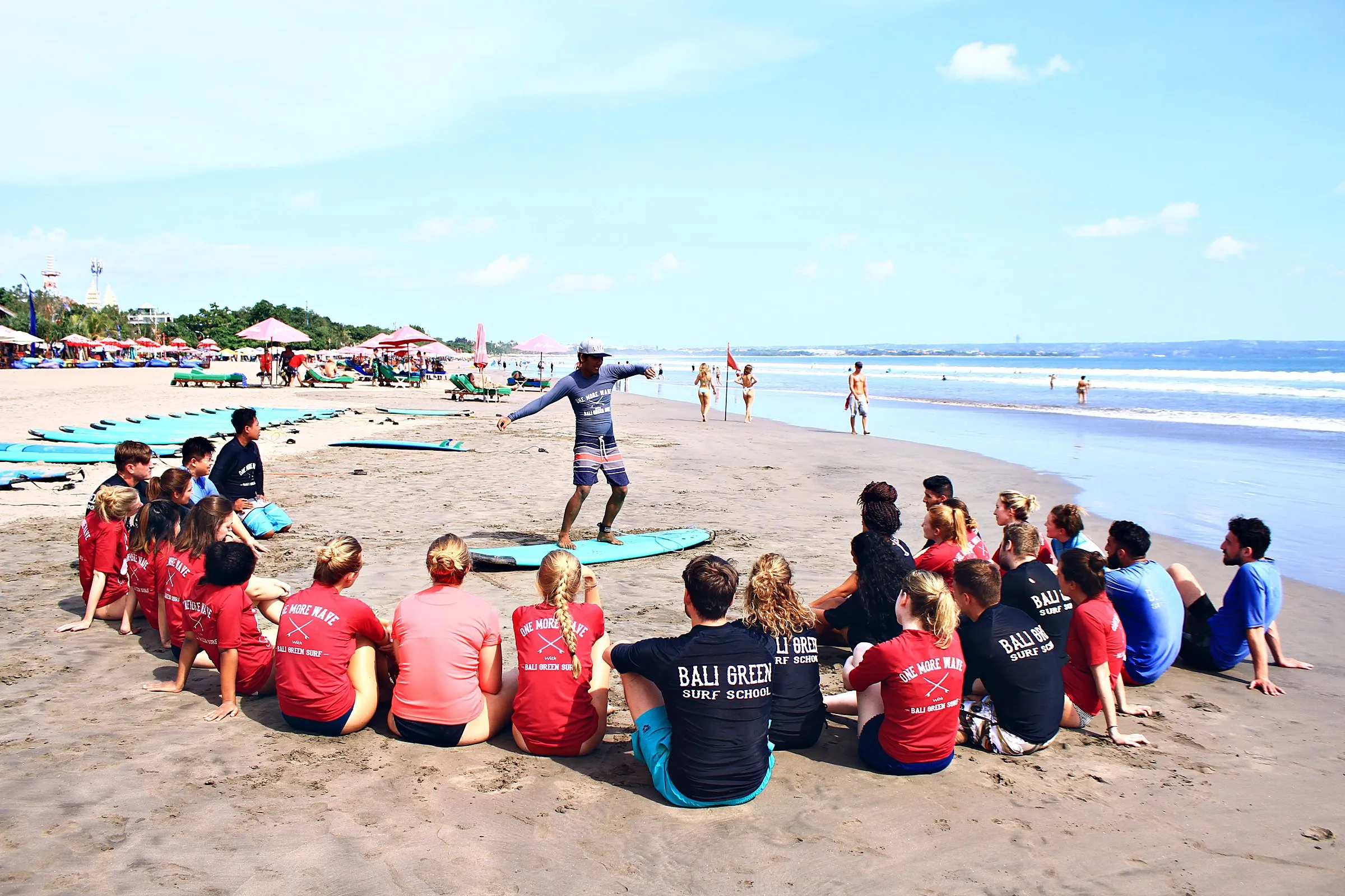 GoBali students at a surf lesson on the beach in Bali
